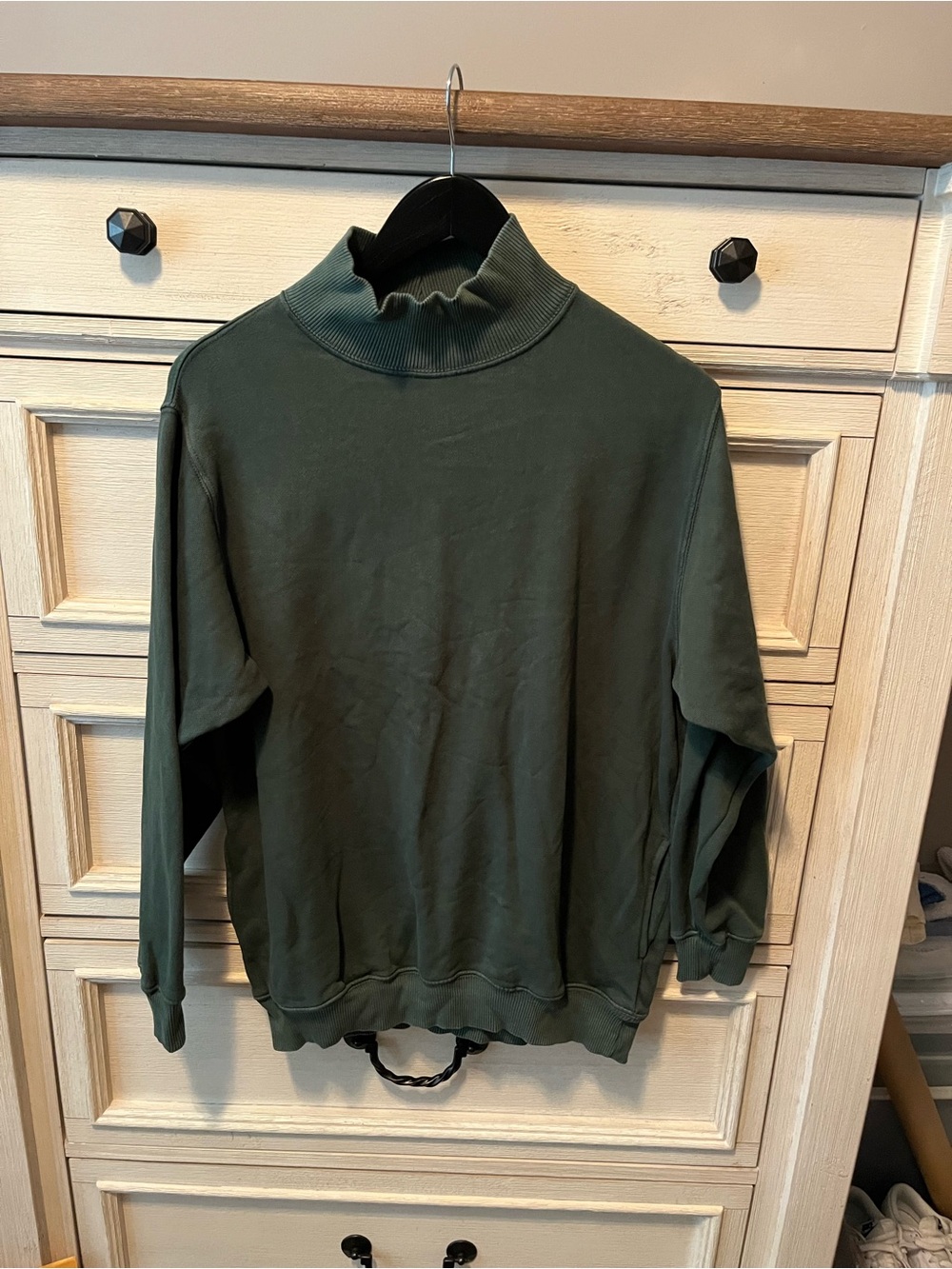 Woman’s Green Mock Neck Sweater